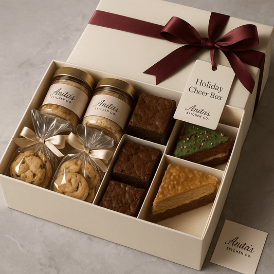 Holiday Cheer Box with cookies, brownies, seasonal cake slices in elegant packaging with ribbon and gift tag, available nationwide.